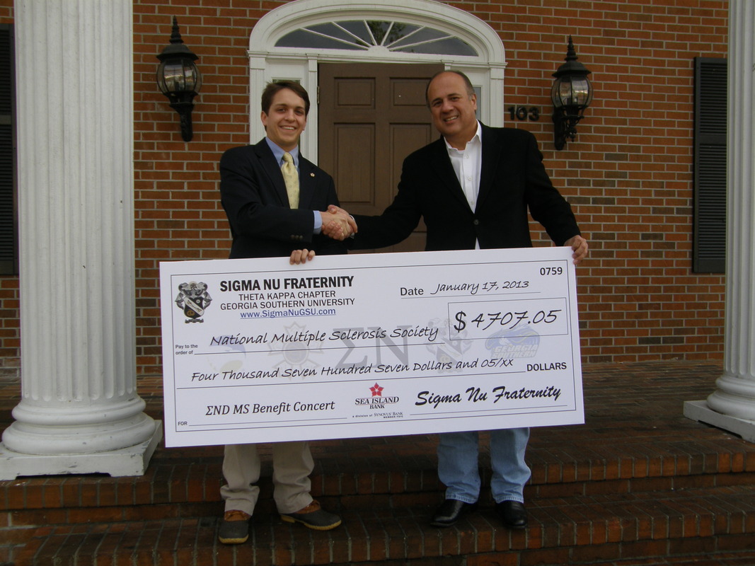 Brian Griffin presents check to Chuck Rangel, National MS Society